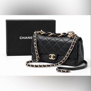 Chanel 19 Navy blue Quilted champagne color strap.